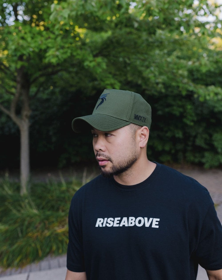 A collection of motivational hats for men and women featuring symbolic logos and designs that represent resilience—perfectly paired with motivational shirts, hoodies, and clothing for strength and purpose.