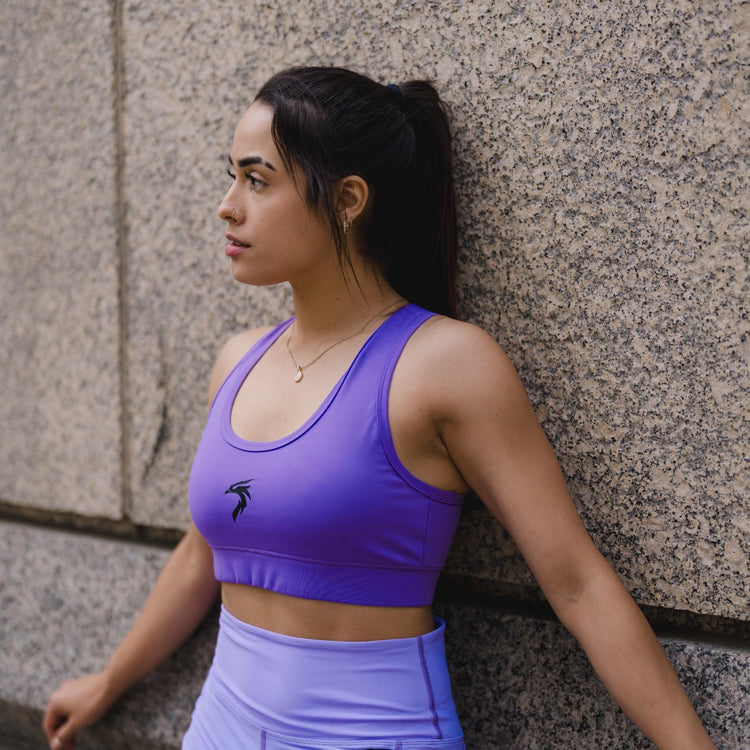 A collection of motivational tank tops and activewear for men and women, featuring inspiring shirts, hoodies, and sports bras that promote strength, mental health awareness, and personal empowerment.