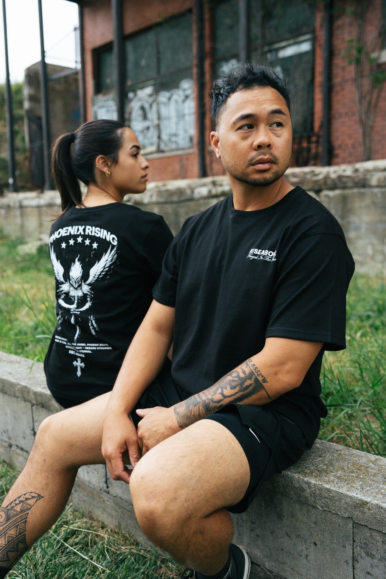 Riseabove Phoenix Rising Premium T-Shirt back design featuring angel phoenix emblem, Detroit resilience apparel