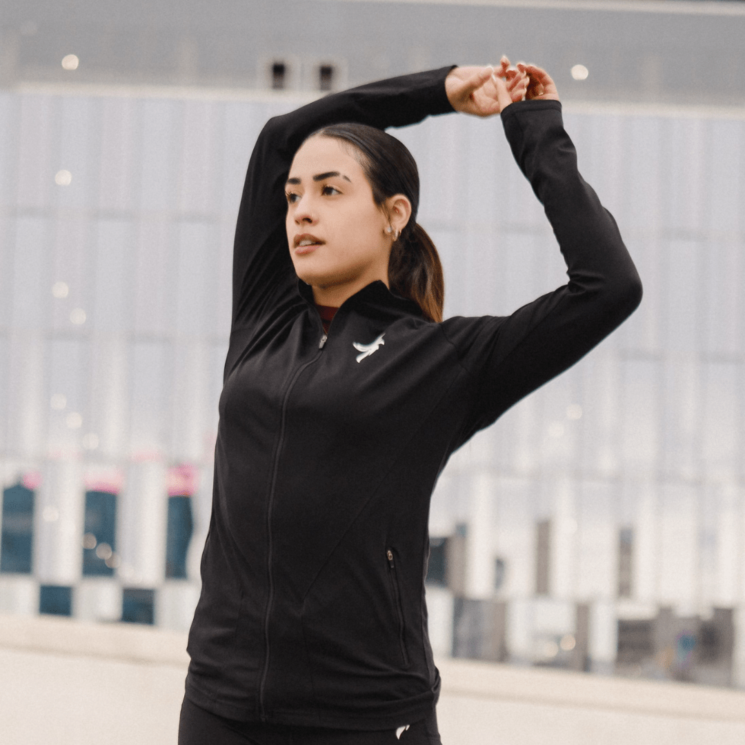 Women’s zip-up jackets featuring athletic quarter zips and performance wear. Stylish, durable, and designed for those who rise from the ashes.