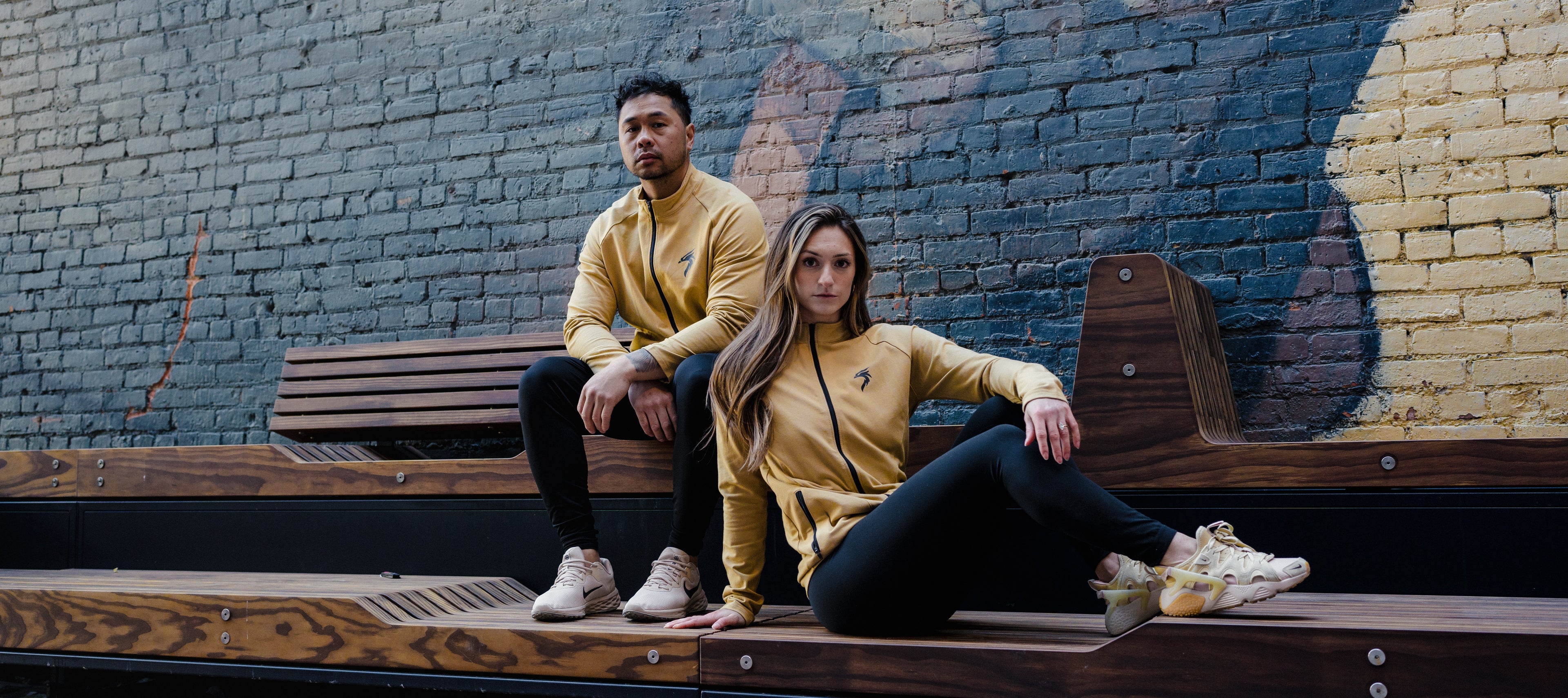 Riseabove athletes training in motivational gym wear for mental health recovery.