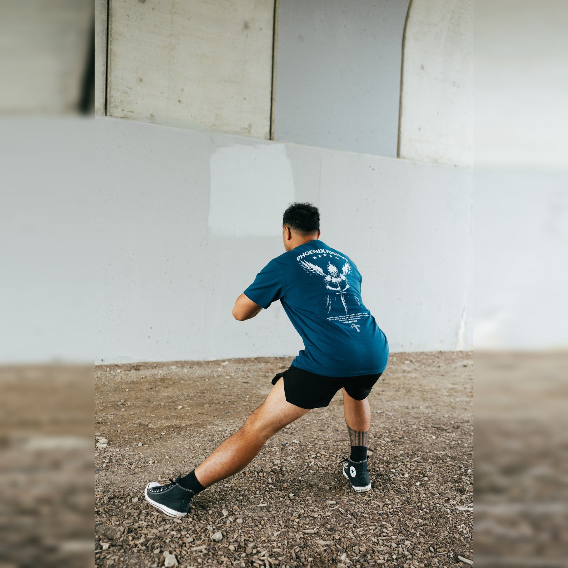 Men's Phoenix Rising Premium T-Shirt in Storm Blue, lifestyle photo, back