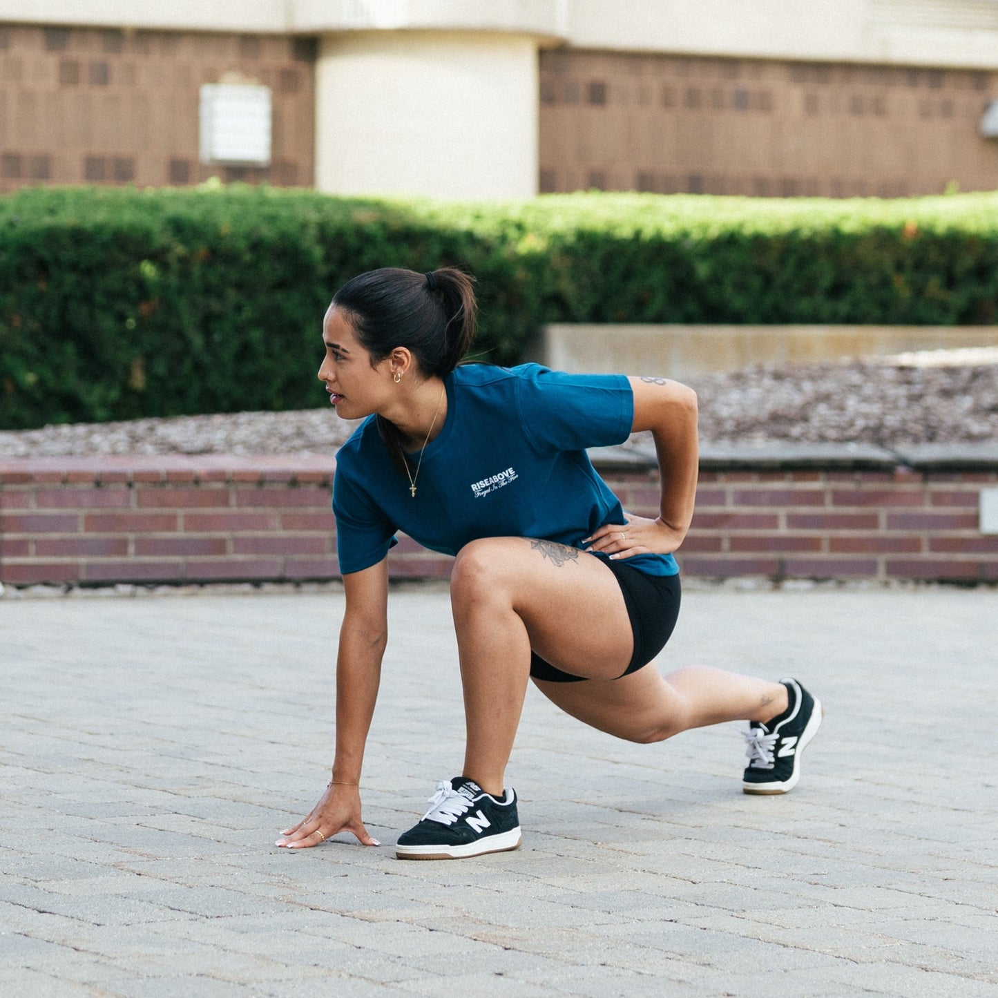 Women's Phoenix Rising Premium T-Shirt in Storm Blue, lifestyle action photo