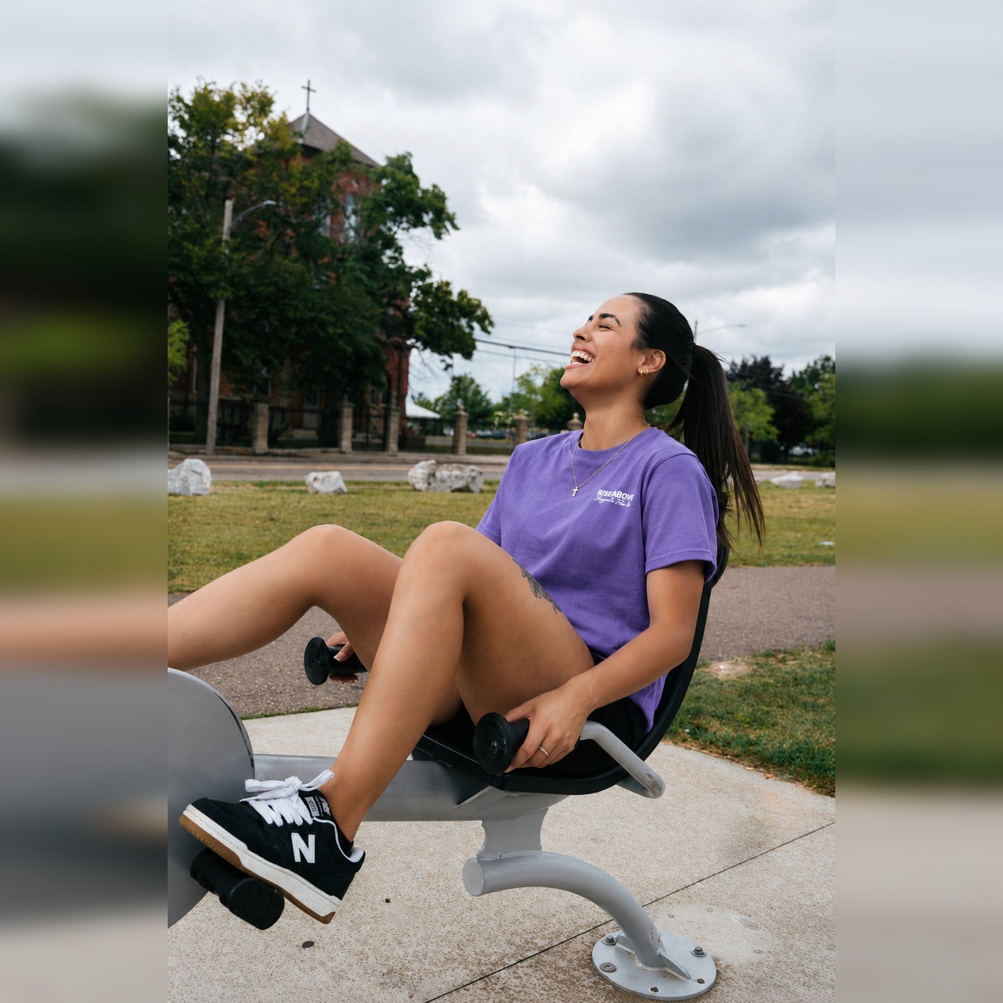 Women's Phoenix Rising Premium T-Shirt in Vintage Purple, lifestyle action photo